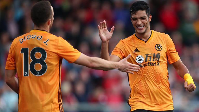Diogo Jota and Raul Jimenez celebrate