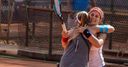 German smiles with or without a racket!