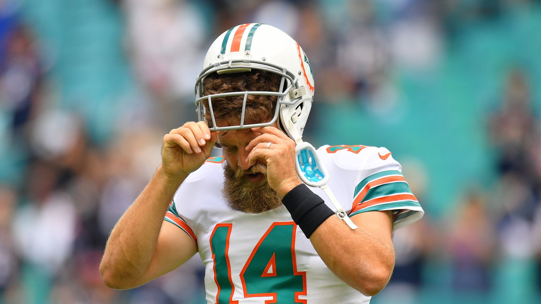 Ryan Fitzpatrick of the Miami Dolphins warms up prior to the game