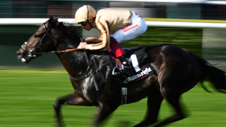 Frankie Dettori riding A'Ali to victory
