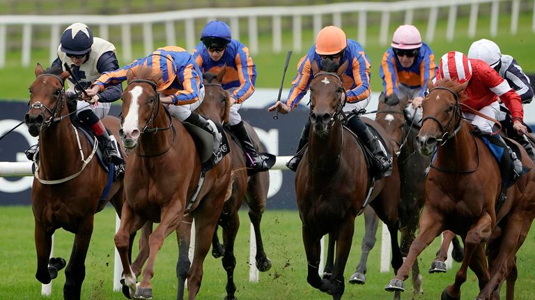 Ryan Moore riding Love (second left, white face) to win the Moyglare Stud Stakes at the Curragh