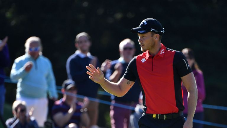 Danny Willett battled his way to a three-shot victory at Wentworth
