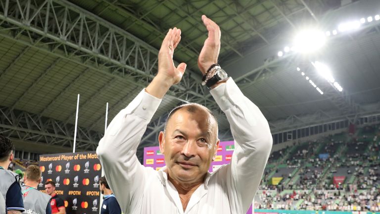 Eddie Jones applauds the crowd after the win in Kobe