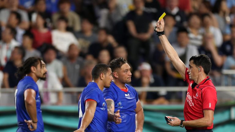 Referee Pascal Gauzere sin-binned Samoa wing Ed Fidow (second from left) twice in the awarding of two penalty tries for Scotland