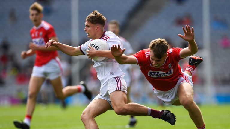 Daniel Cox of Galway in action against Daniel Peet of Cork