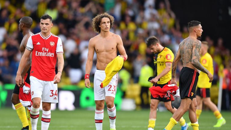 David Luiz (right) should be named Arsenal captain, according to Merson