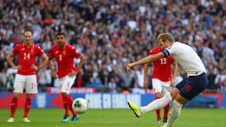 Kane scores from the penalty spot to complete his hat-trick against Bulgaria