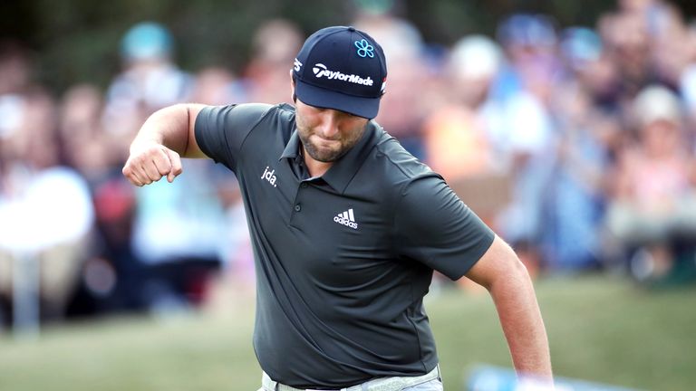Jon Rahm celebrates after making a vital par at the 18th during the third round at Wentworth