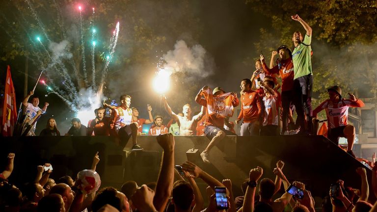 Red Star Belgrade fans celebrate qualifying for the Champions League group stage