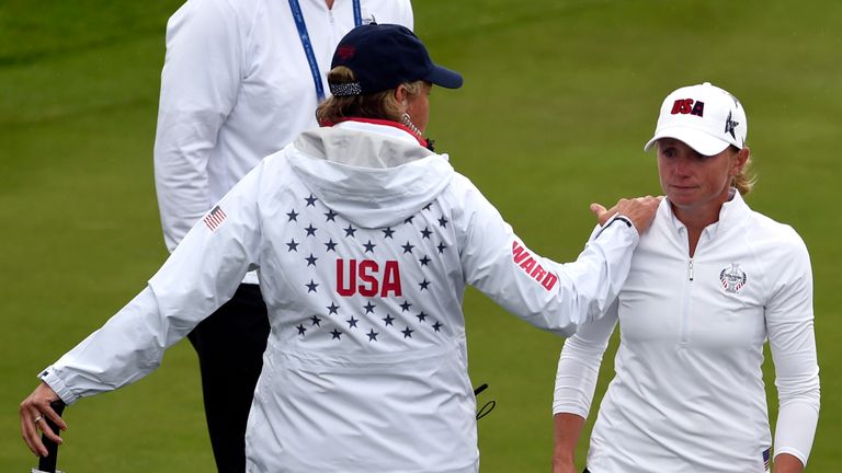 Lewis was consoled by captain Juli Inkster as it became clear she would be unable to play this week