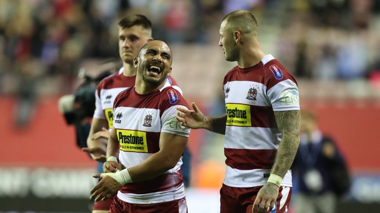 Thomas Leuluai and Zak Hardaker celebrate a hard-fought win for Wigan