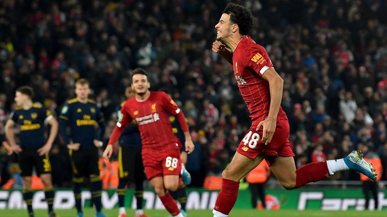 Curtis Jones shows his delight at having scored from 12 yards in the shootout