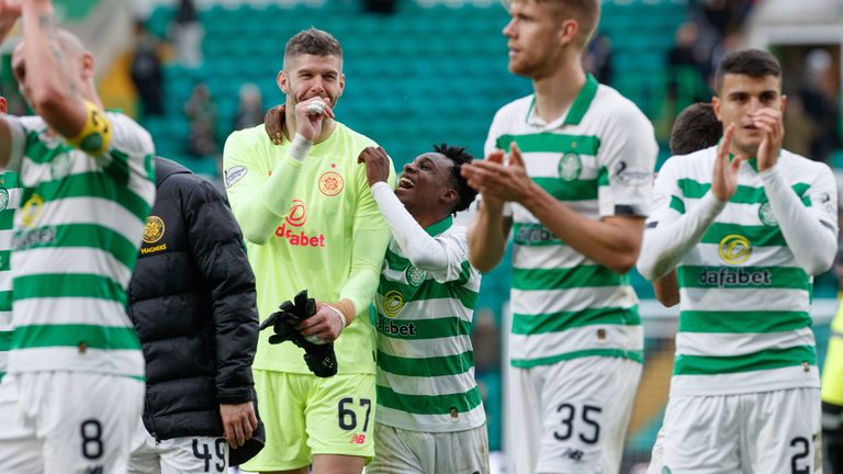 Celtic's Fraser Forster with Jeremie Frimpong