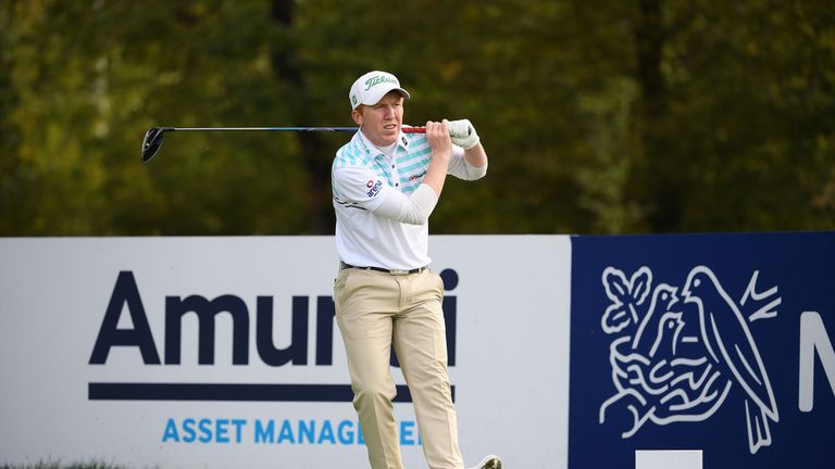 Gavin Moynihan came close to claiming a £130,000 sports car for a hole-in-one at the Open de France, but his ball hit the bottom of the cup and bounced back out!