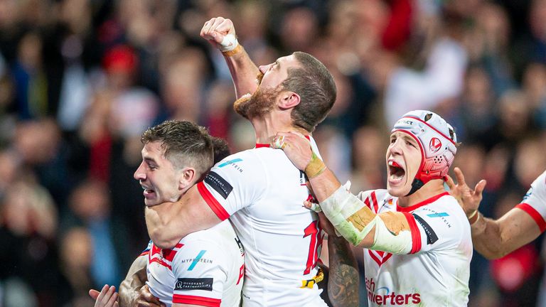 Mark Percival celebrates his second-half try for St Helens