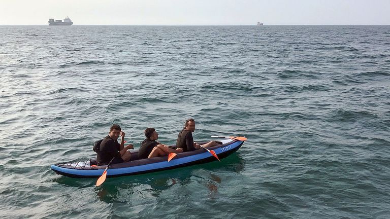 Some migrants attempt to reach the English shoreline in inflatable canoes - these men were rescued by lifeguards in August 2018