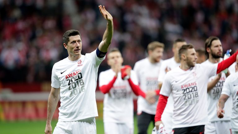 Robert Lewandowski leads the lap of honour as Poland reached the finals