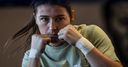 Katie seeks icon status but danger lurks