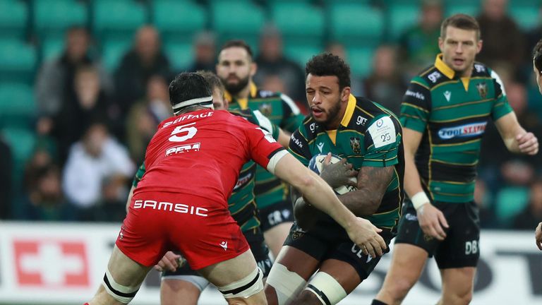 Courtney Lawes  takes on Loann Goujon