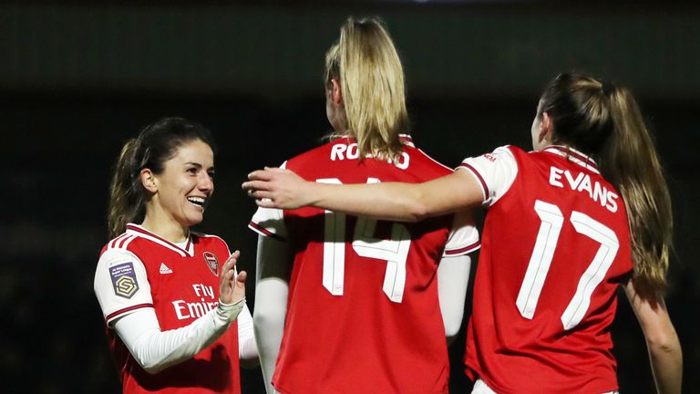 Danielle van de Donk celebrates with team-mates Jill Roord and Lisa Evans after scoring Arsenal's sixth goal at home to Slavia Prague