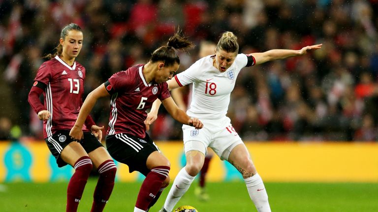 England's White and Lena Oberdorf of Germany battle for possession