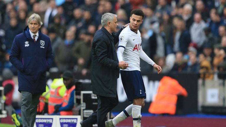 Mourinho pats Dele Alli on the back after an excellent performance