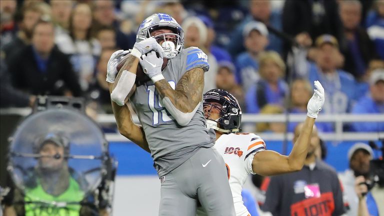 Lions receiver Kenny Golladay rises to make the catch ahead of Bears cornerback Kyle Fuller