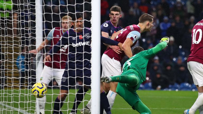 Roberto scores an own goal for Burnley's third at Turf Moor on Saturday
