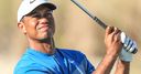 Woods shines as Reed penalised for bunker shot