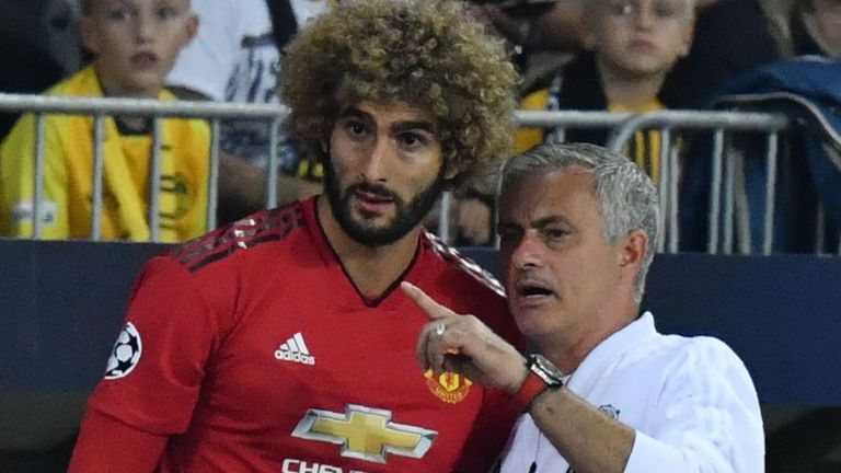Marouane Fellaini (left) is still in contact with Jose Mourinho