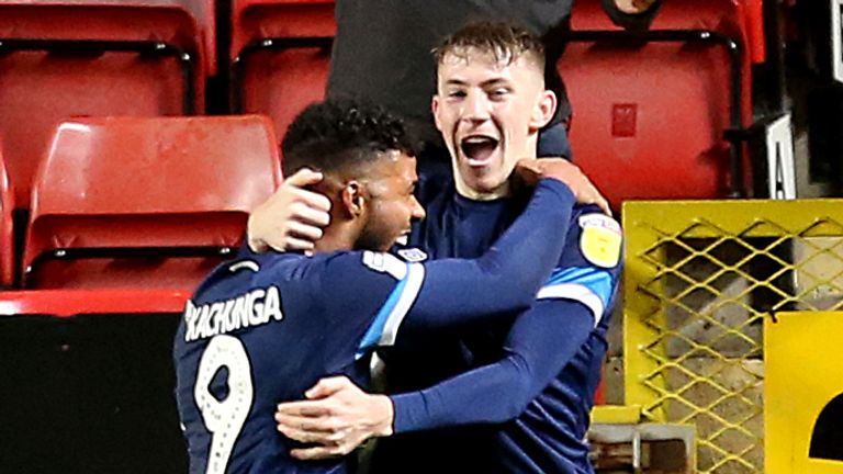 Huddersfield Town's Matty Daly (right) celebrates scoring his side's winner