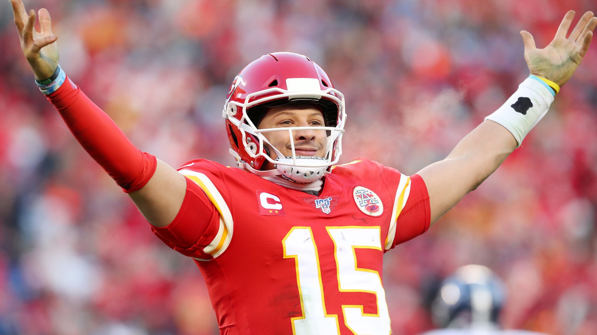 Kansas City, United States. 19th Jan, 2020. Kansas City Chiefs quarterback  Patrick Mahomes (15) flexes his muscles after a scoring a touchdown on a  twenty seven yard run against the Tennessee Titans