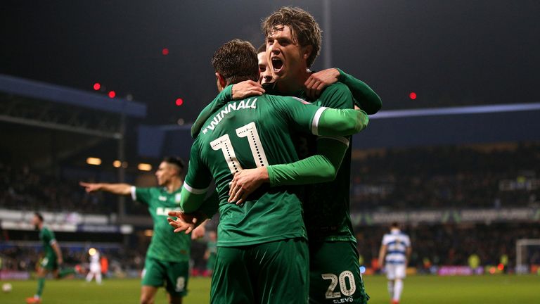Adam Reach celebrates Sam Winnall's goal