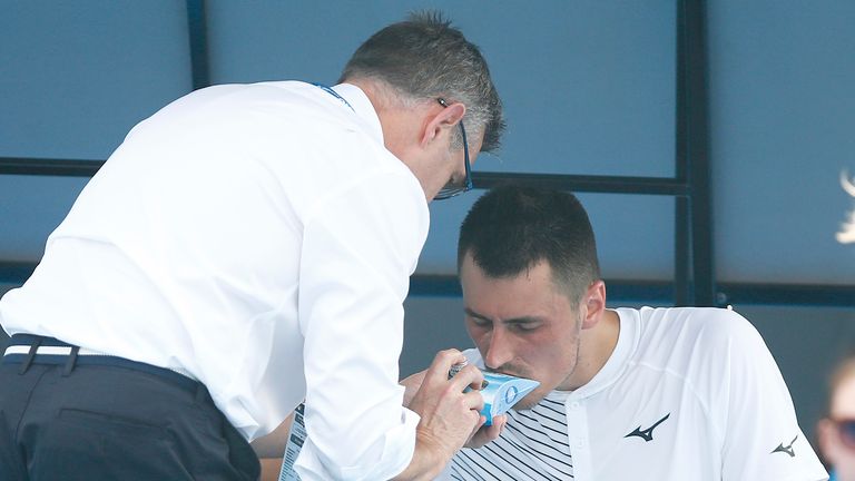 Former world number 17 Bernard Tomic received medical attention on court during his qualifier