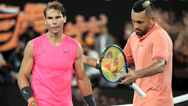 Kyrgios (R) shakes hands with Nadal at the net following their compelling fourth-round contest