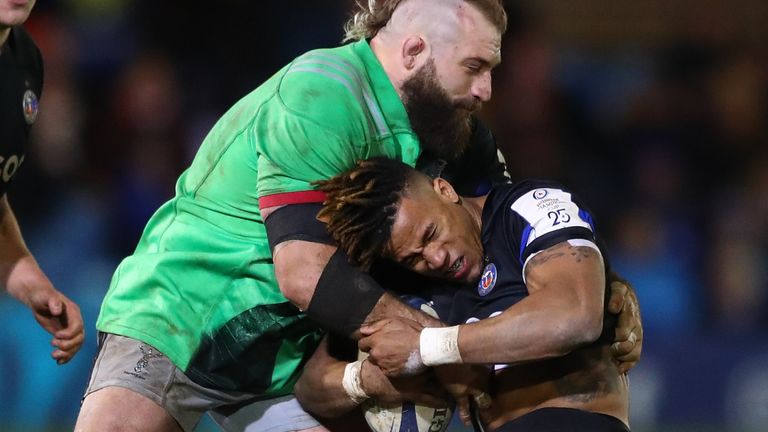Anthony Watson is tackled by England team-mate Joe Marler