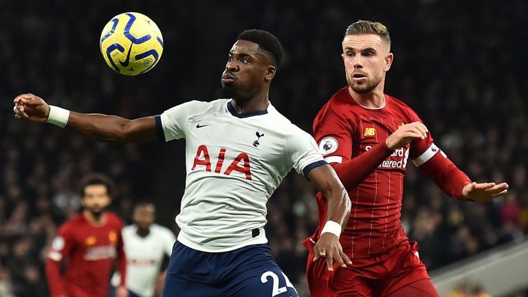 Serge Aurier is put under pressure by Jordan Henderson