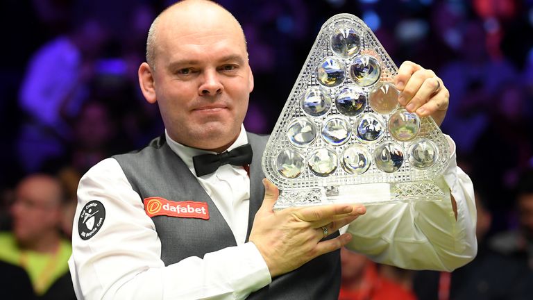 Stuart Bingham holds the Paul Hunter Trophy after winning the Masters at Alexandra Palace in January