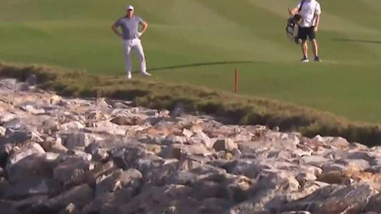 Callum Shinkwin enjoyed some good fortune at the 18th during the second round of the Oman Open as his second shot played pinball on the rocks before returning to dry land