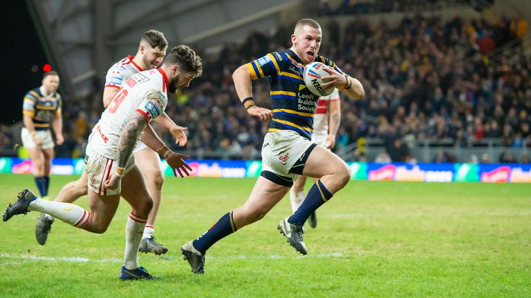 Cameron Smith races away for one of his two tries against Hull KR