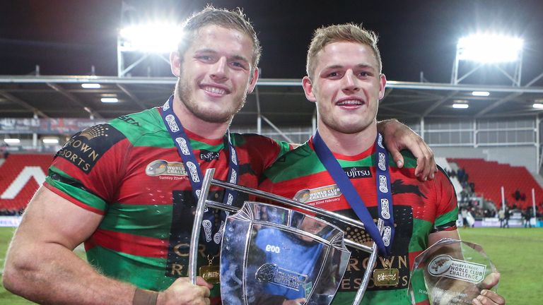 The Rabbitohs' George Burgess (right) and Tom Burgess (left) celebrate beating St Helens
