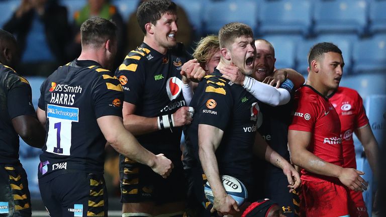Jack Willis celebrates after scoring a try for Wasps