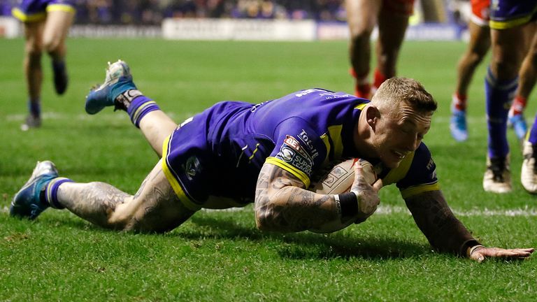 Warrington Wolves' Josh Charnley goes over for a try against St Helens