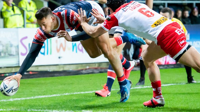 Joseph Manu stretches to score his first try