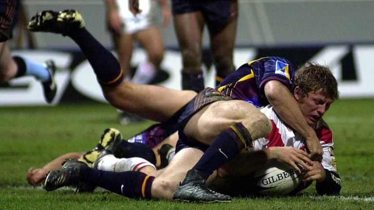 Sean Long goes over for a try in the win over Brisbane