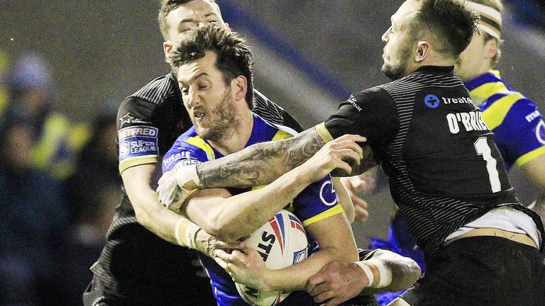 Stefan Ratchford tries to burst through the Wolfpack defence