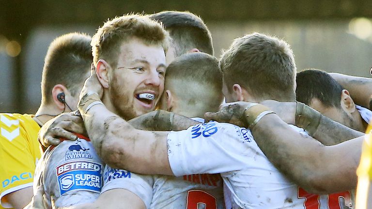 Wakefield try scorer Tom Johnstone is congratulated by his team-matesFIL