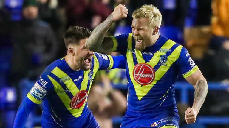 Blake Austin celebrates with Gareth Widdop after kicking the game-winning drop goal