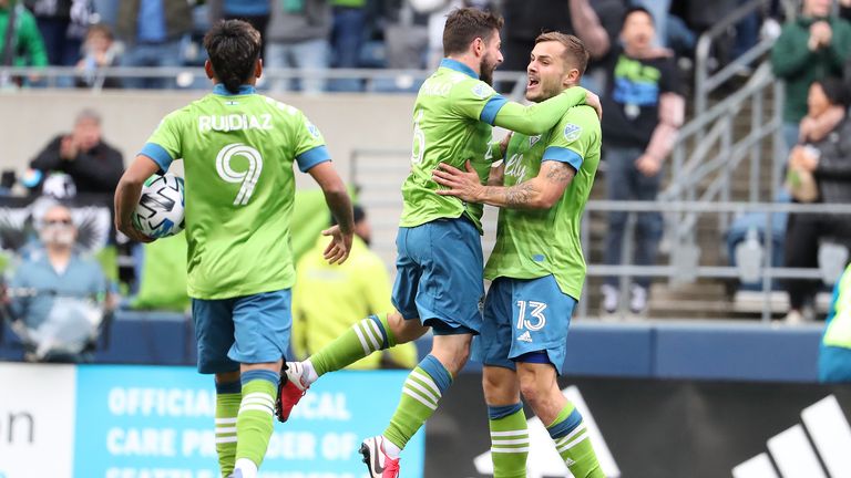 Jordan Morris (R) celebrates his goal with Joao Paulo
