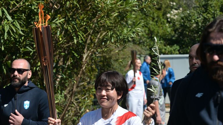 Athens Olympics women's marathon gold medalist Mizuki Noguchi was the second runner in the Tokyo Olympics torch relay in Olympia